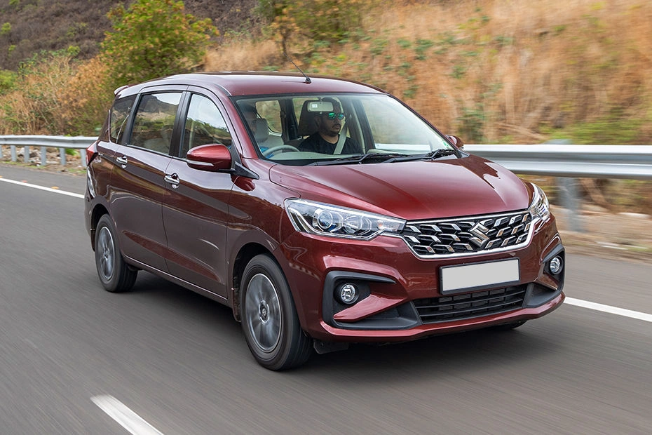 Maruti Suzuki Ertiga airport pickup service with chauffeur and family luggage